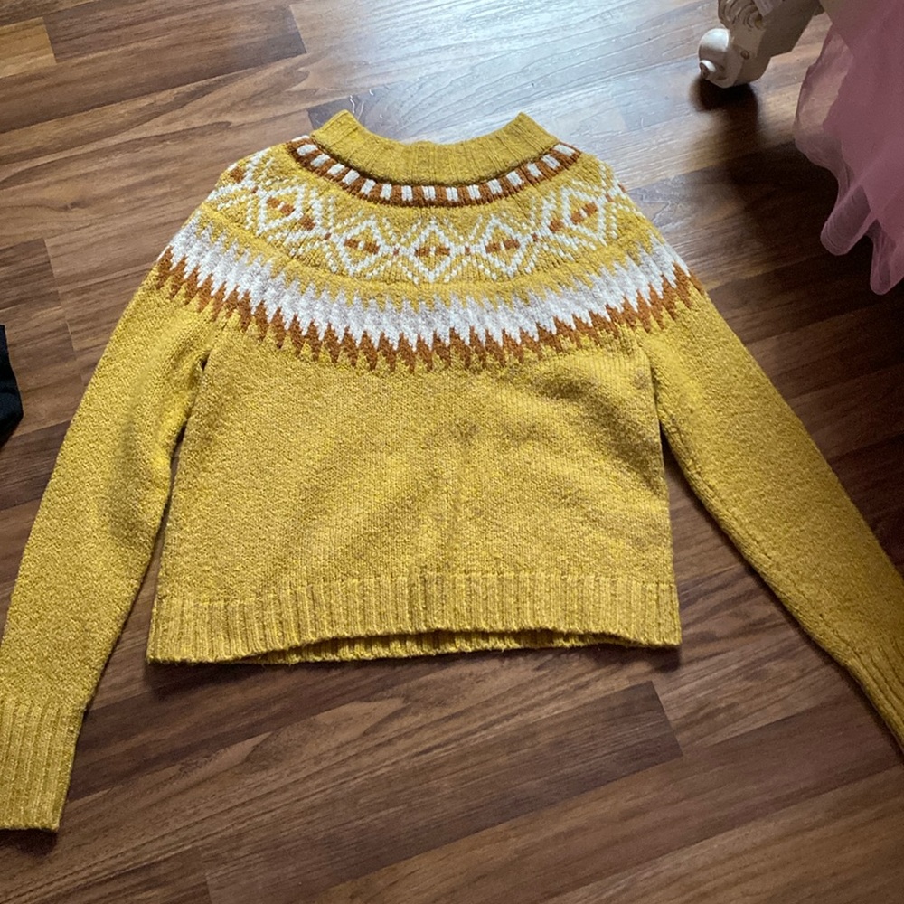 yellow sweater